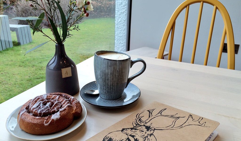 Writing poetry in a cafe in Grasmere